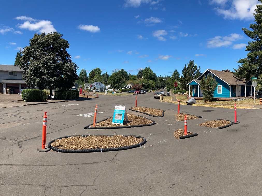 A temporary pedestrian refuge island.